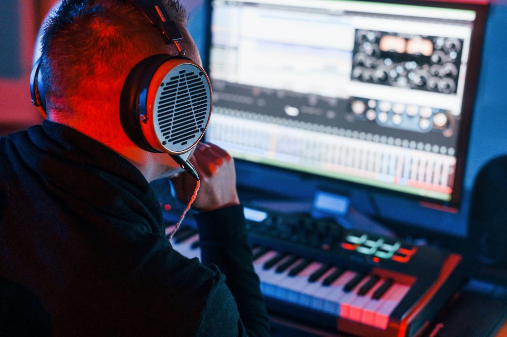 Understanding the Role of Music Producers