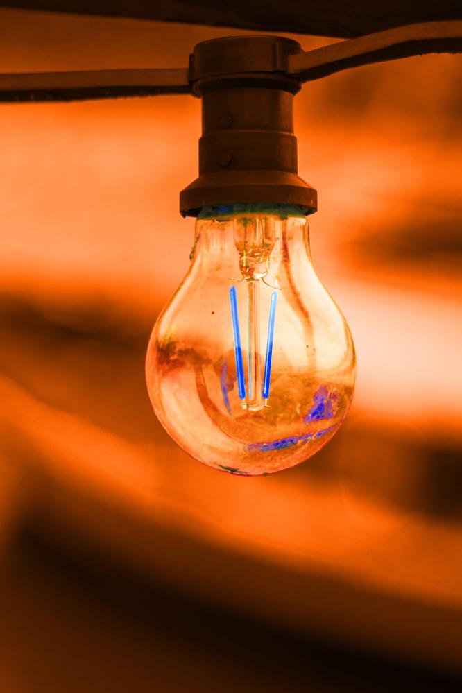 vecteezy orange glass bulb with socket on an orange background 60458947 805