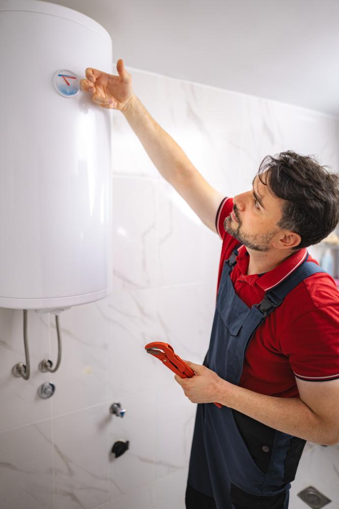 vecteezy plumber checking temperature of water heater and holding 70531209 227