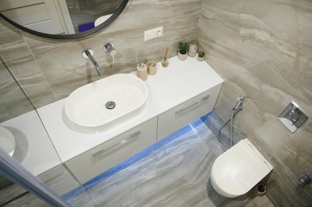 Elegant hotel bathroom interior highlighting clean toilet bowl design