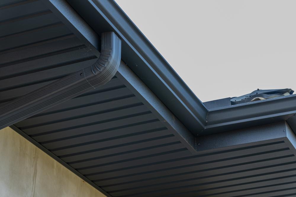 How Do Gutter Guards Enhance Gutter Performance?