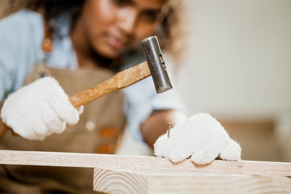 Skilled carpenter hammering nails in Baltimore, Maryland