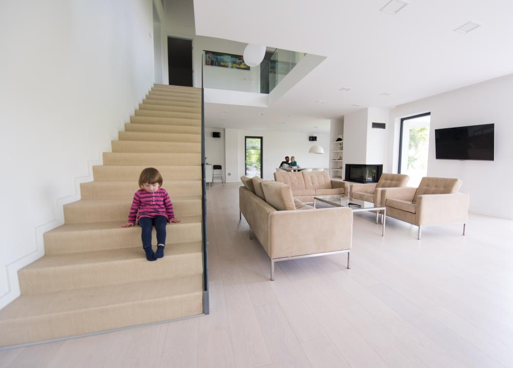 Family enjoying their modern living room with new flooring in Melbourne, FL