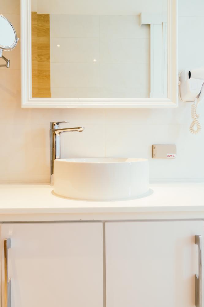Elegant bathroom sink and faucet showcasing quality craftsmanship