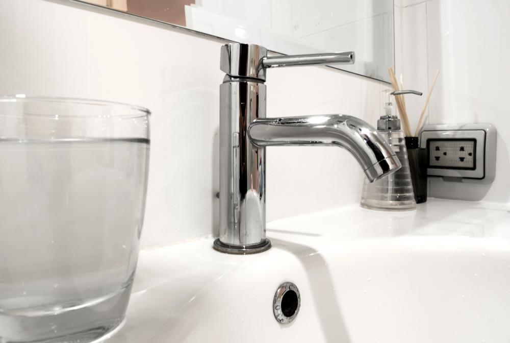 Modern Bathroom Faucet with Clear Water Flow Demonstrating Hydro Jet Plumbing Efficiency