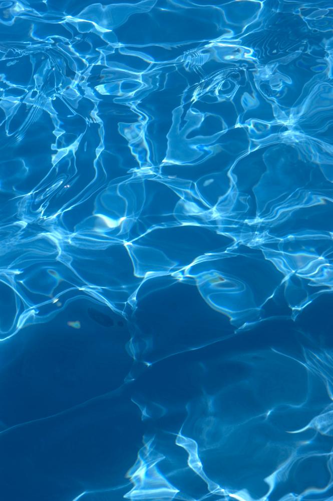 Crystal Clear Blue Pool Water Heated for Comfort in Palm Coast
