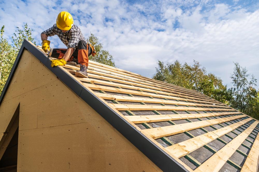 Expert roofer assembling a wooden roof in Philadelphia