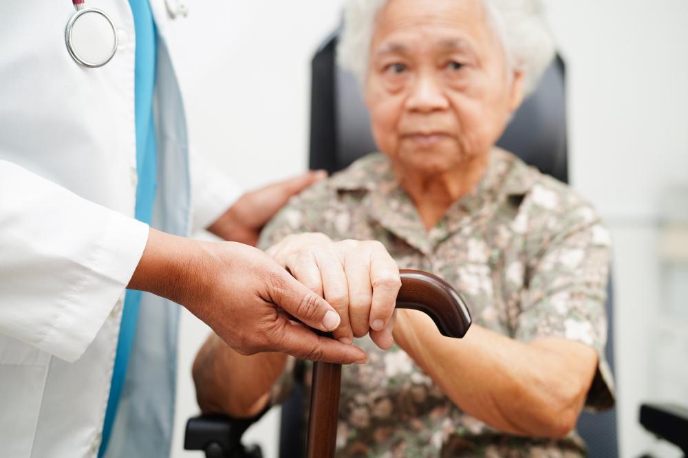 Professional Caregiver Engaging with Elderly Patient