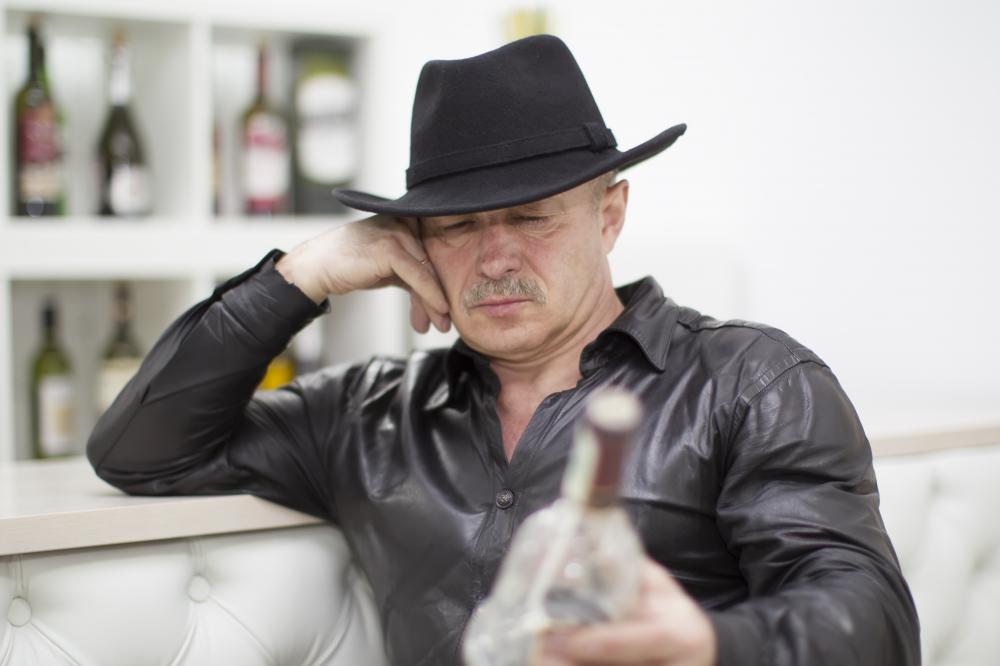 The struggle of elder addiction: A senior man with whiskey