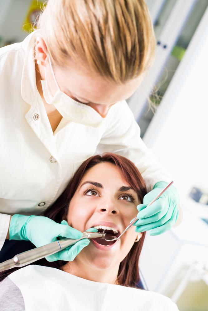 Satisfied patient receiving emergency dental care