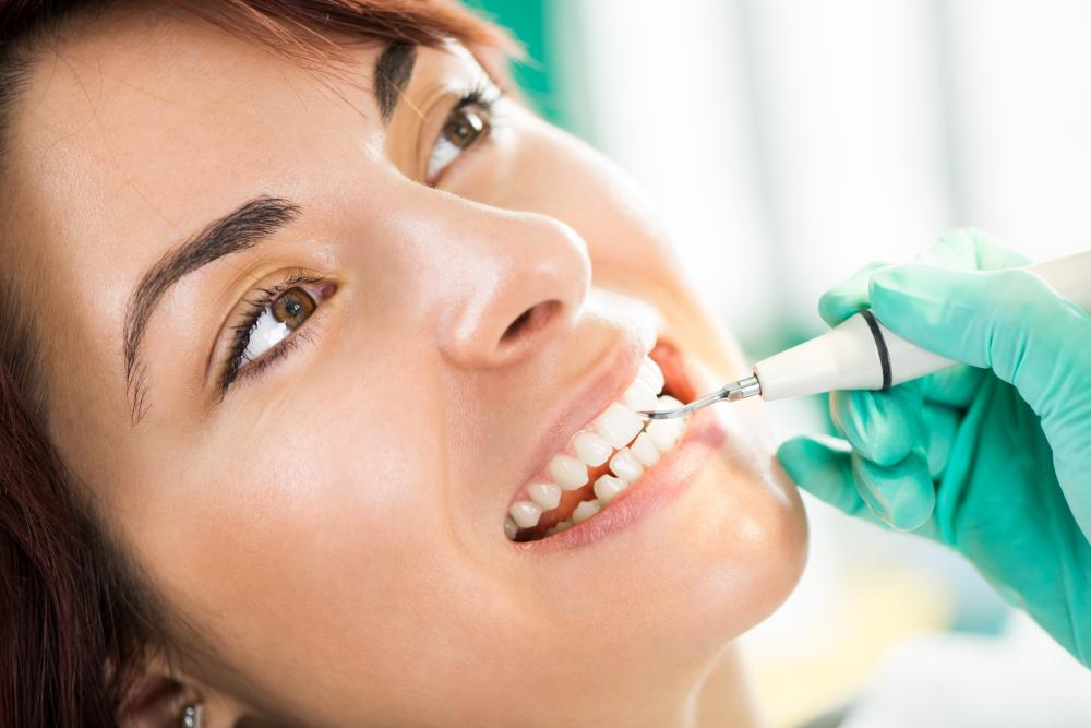 Orthodontist performing professional dental cleaning in Orland Park