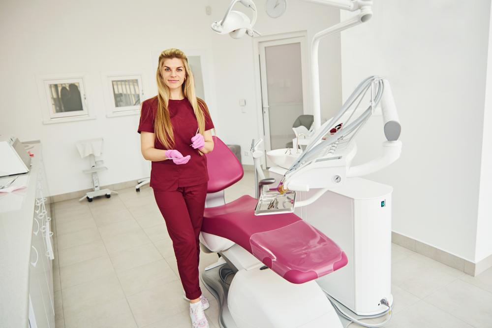 Dental professional performing precise tooth bonding procedure