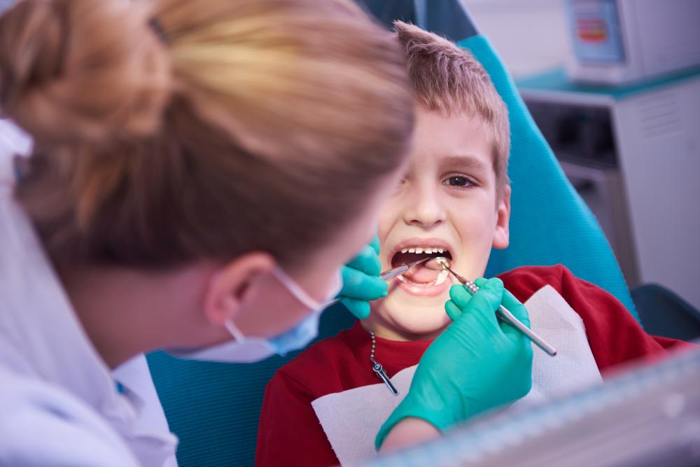 Emergency Dentist in action providing urgent dental care