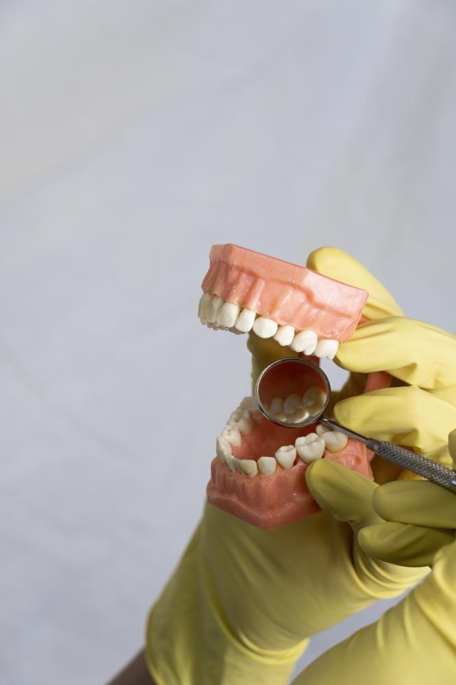 Senior patient experiencing modern denture fitting