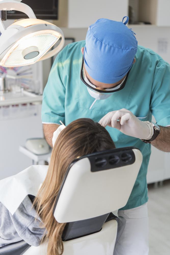 Patient and dentist discussing same-day extraction options