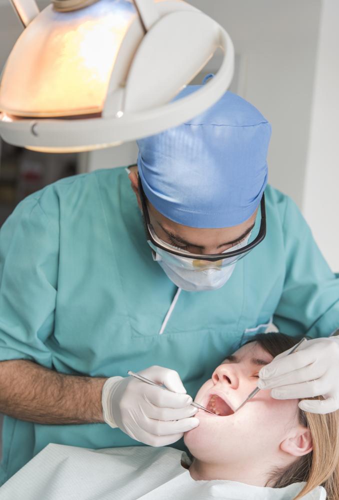 Patient receiving emergency dental extraction