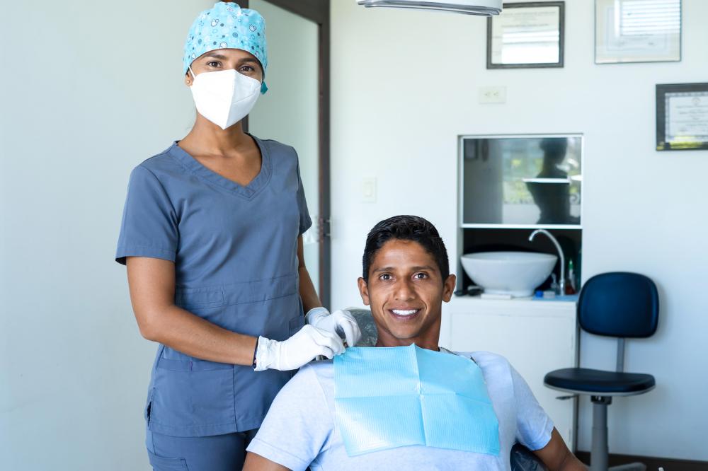 Dental professional preparing for a veneer teeth whitening procedure