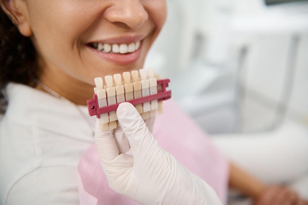 Expert dentist providing veneers in Jupiter, FL dental clinic