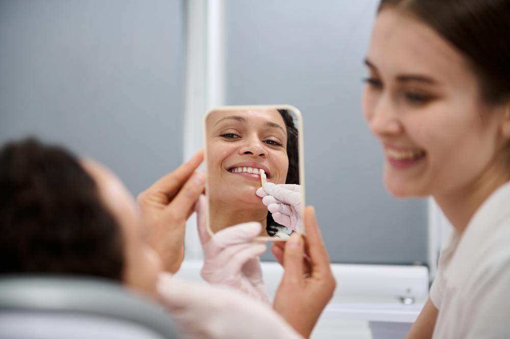 A professional cosmetic dentist providing a bright smile makeover in Austin