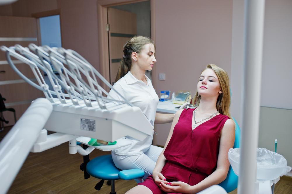 Orthodontist preparing silicone for dental impression
