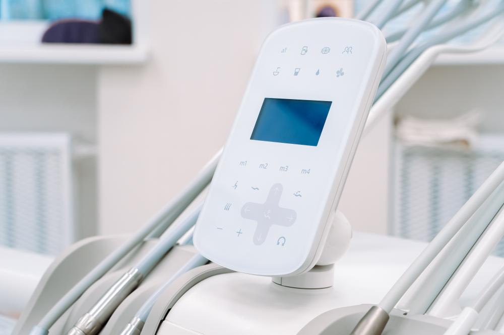 Dentist engaging patient in a dental office resonates with client care in Rife Machine Therapy