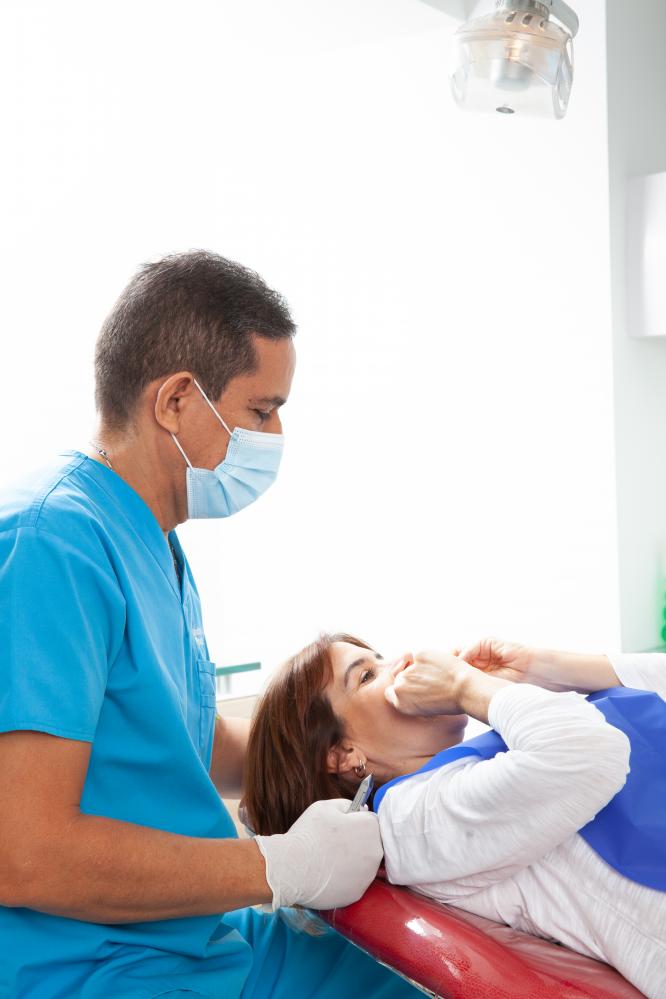 Caring Dentist Providing Comfortable Emergency Care