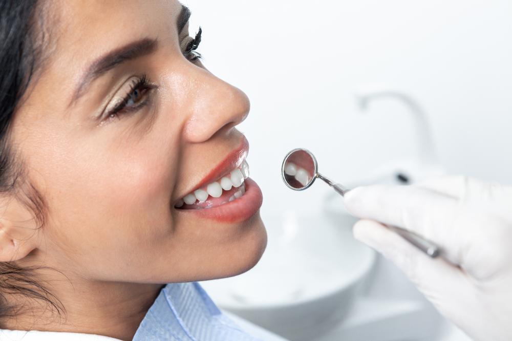 Caring dentist providing emergency dental care at Smiles of Winter Haven