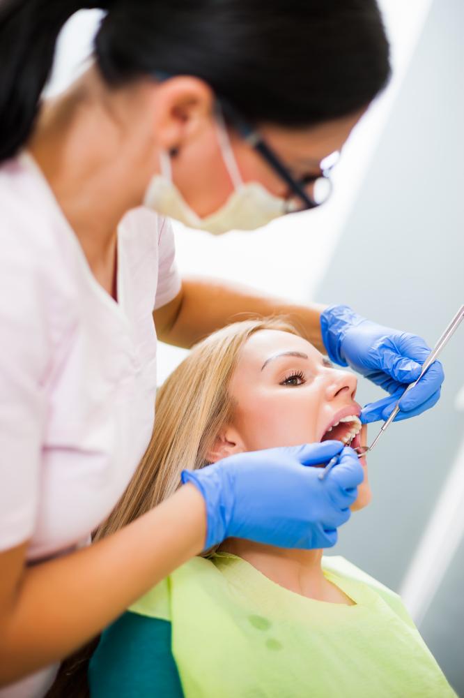 A patient receiving emergency dental treatment