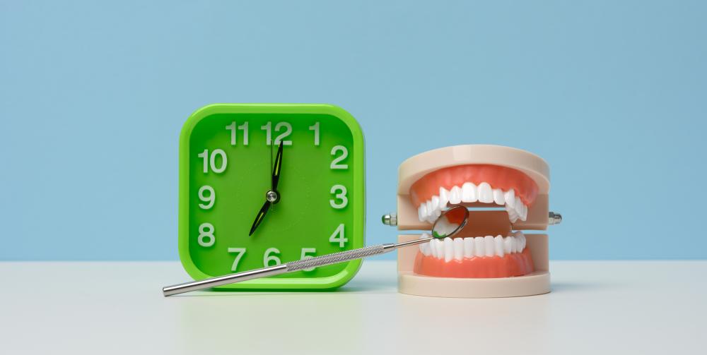 Emergency dentist performing a procedure during after-hours care