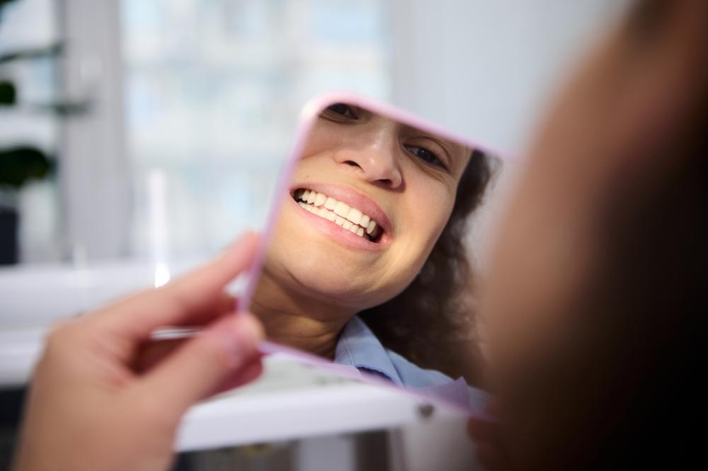 Patient receiving dental veneer treatment