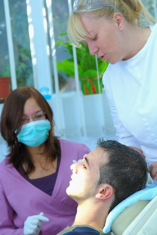 Team of dental professionals reflecting patient-centric marketing strategies