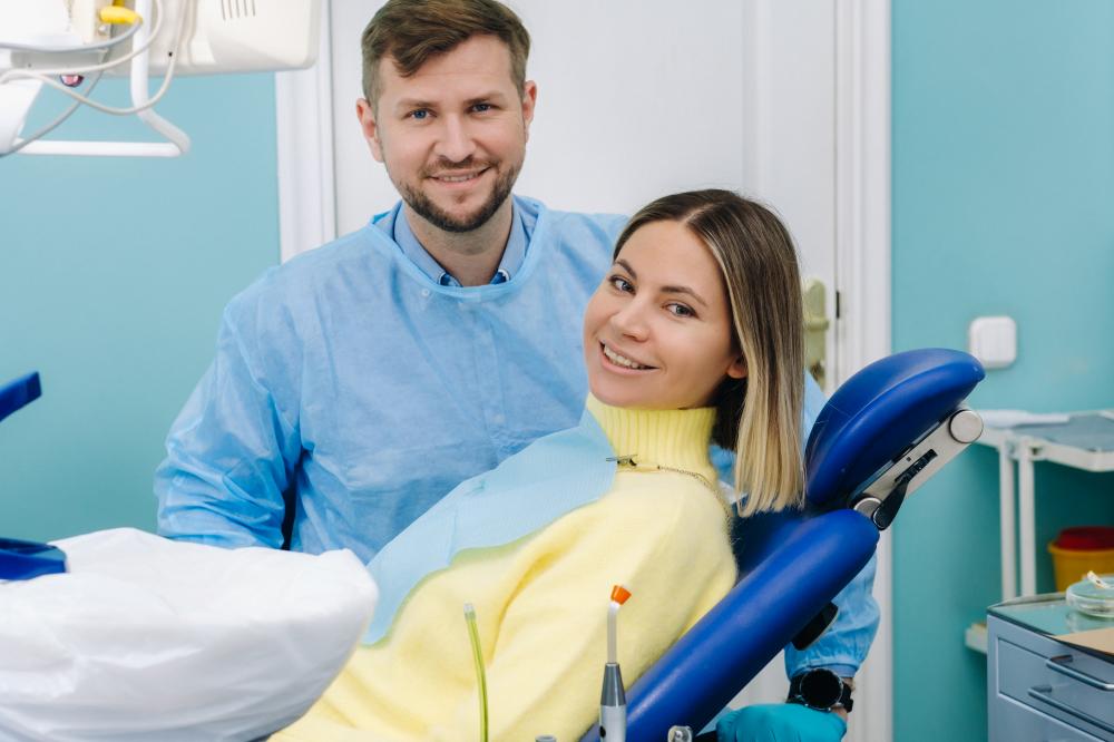Dentist with patient showcasing effective marketing