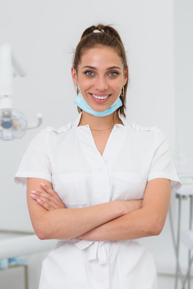 Dentist greeting patient in Philadelphia emergency clinic