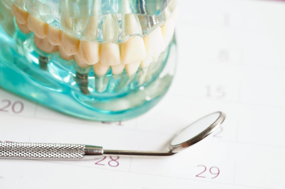 Dental appointment reminder on calendar, concept of 24-hour dentistry
