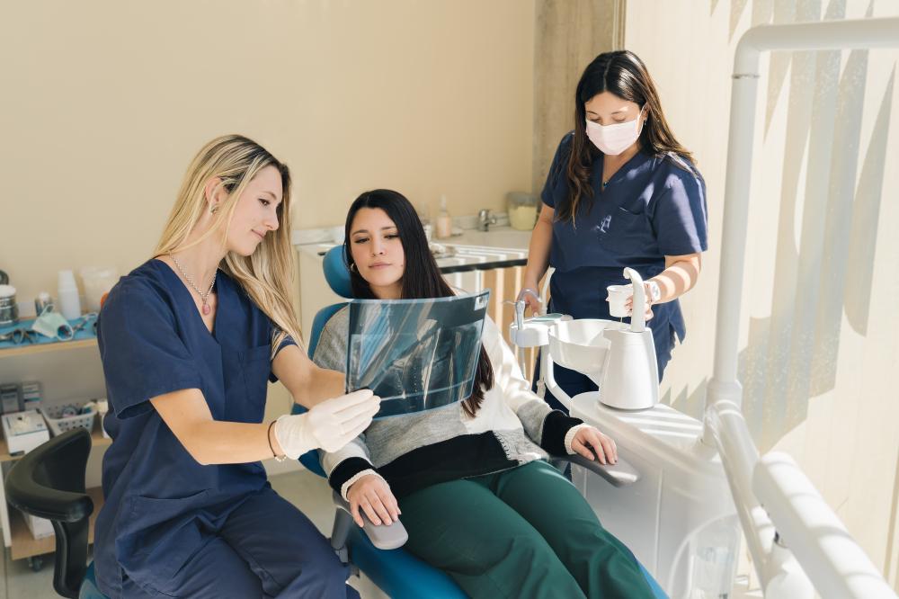 Dentist explaining dental x-rays for informed patient care