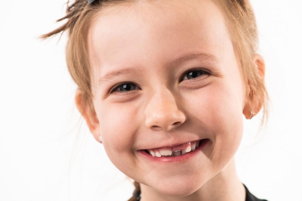 Happy child ready for dental check-up at NE Calgary Childrens Dentistry