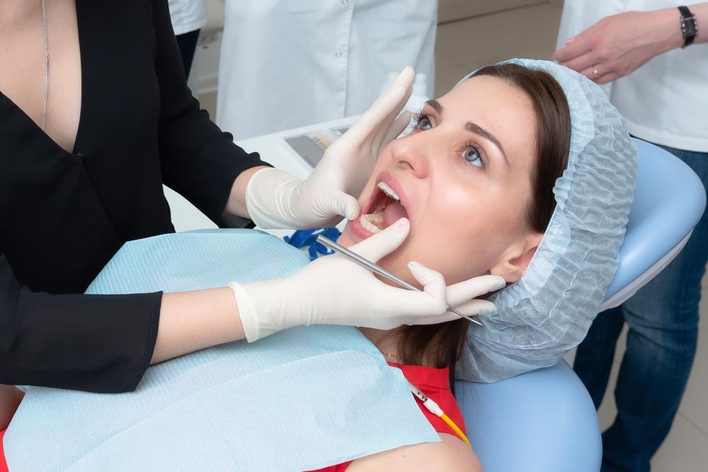 Dentist preparing for a dental emergency procedure