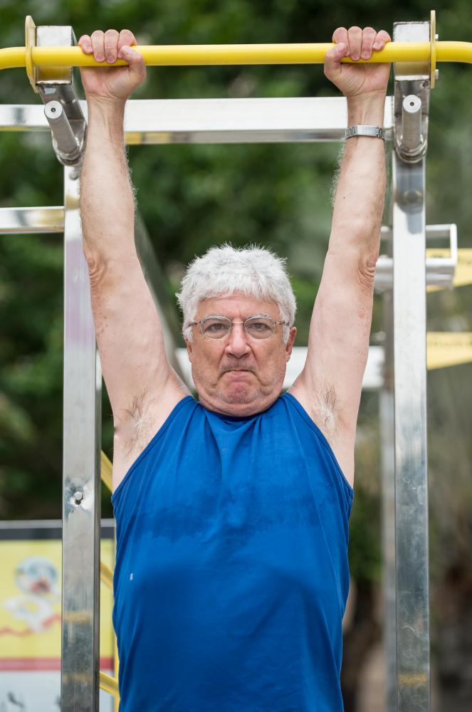 Prostate cancer patient engaging in therapeutic exercise