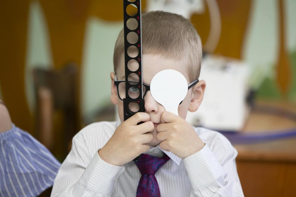 Child engaging in interactive vision therapy exercises