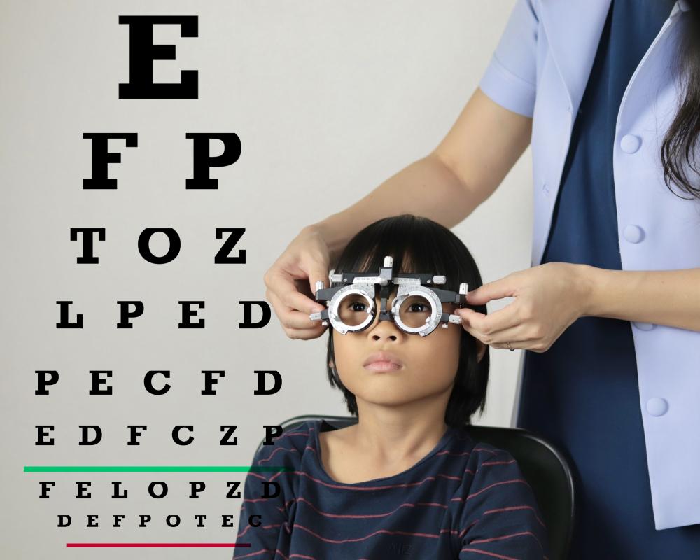 Individual at an eye examination for vision therapy