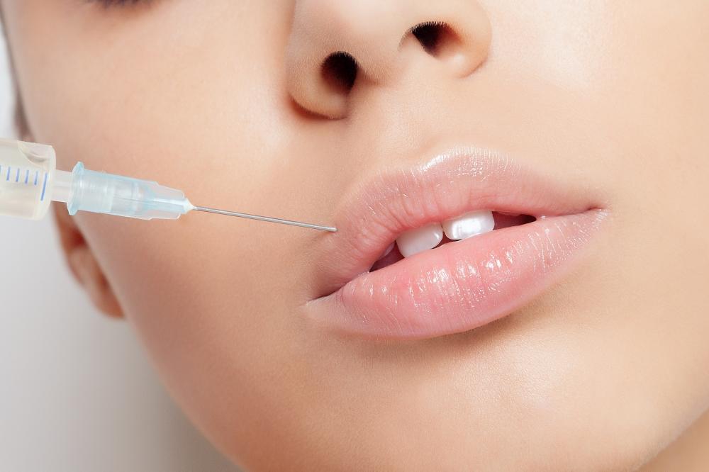Client experiencing a comfortable lip filler procedure