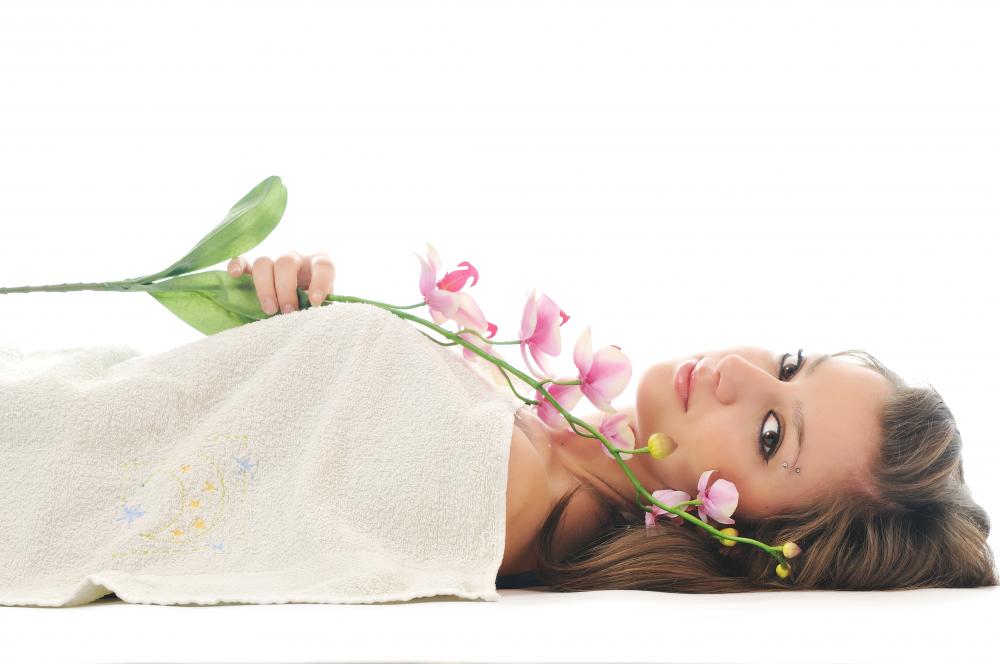 Relaxing Spa Experience with Flower and Towel