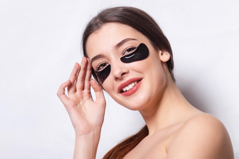 Woman showcasing eye patch therapy for lazy eye treatment
