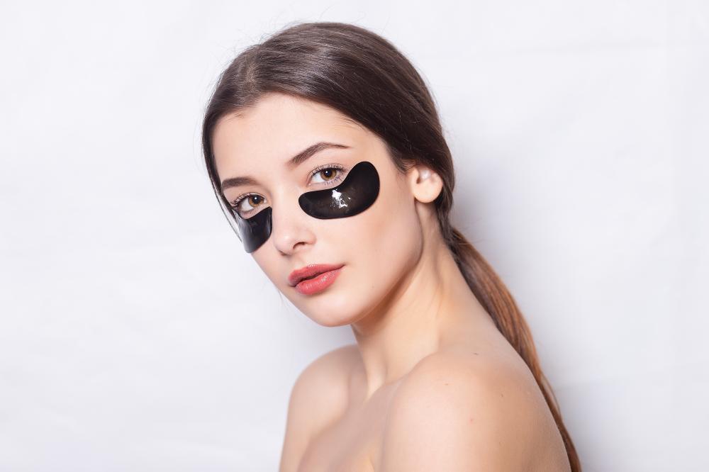 Woman with a natural look wearing an eye patch
