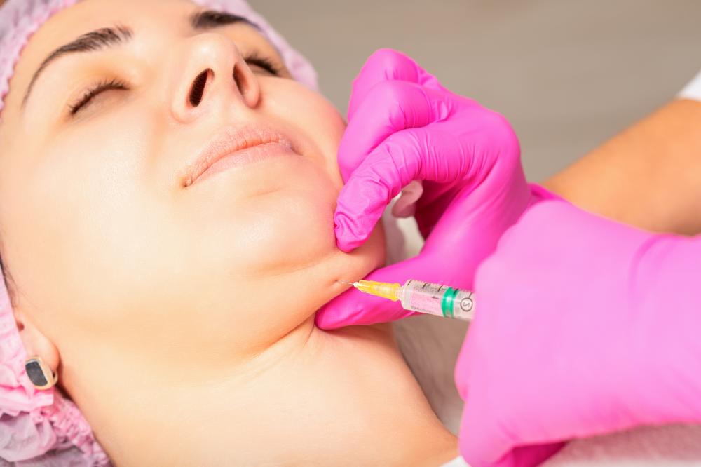 Expert Practitioner Conducting Chin Filler Treatment