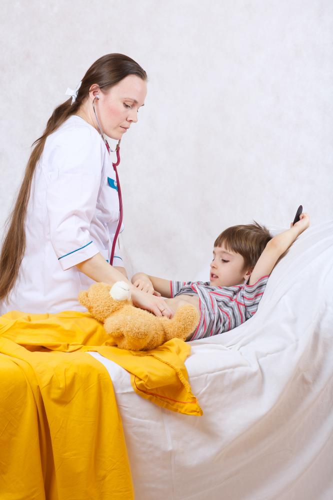 Pediatric surgeon with young patient discussing Hirschsprung disease treatment