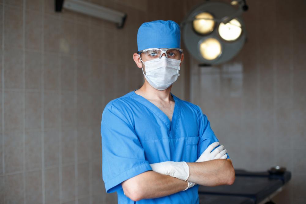 Pediatric surgeon performing advanced esophageal surgery