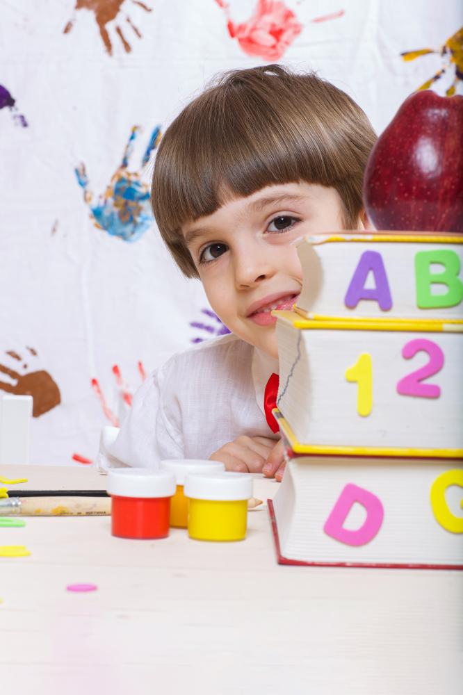 Children engaged in vibrant preschool learning activities with educational support