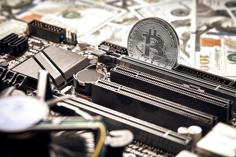 Bitcoin Coin on Video Card Highlighting Whatsminer's Innovative Mining Technology