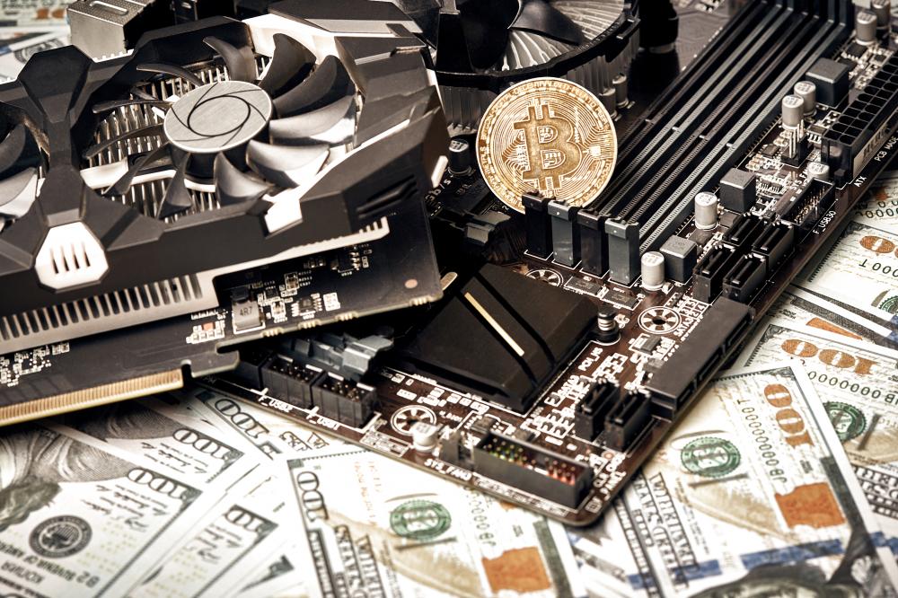 Bitcoin coin on video card depicting ICERIVER Kas Miners' crypto mining capabilities